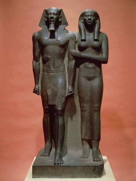 egyptian statue of man and woman